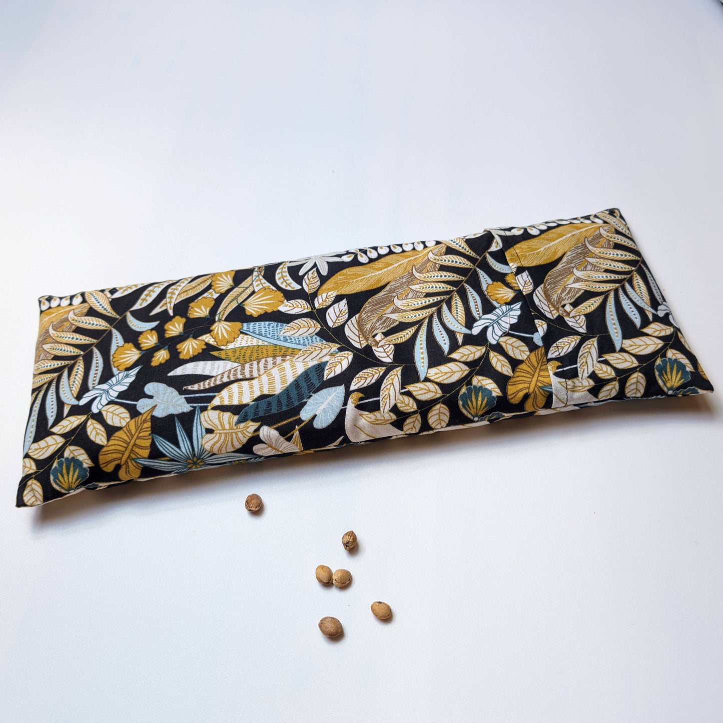 Värmekudde med fyllning av körsbärskärnor